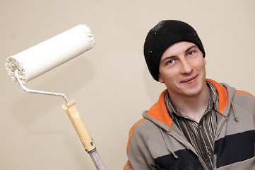 Image showing Painter worker decorator with roller