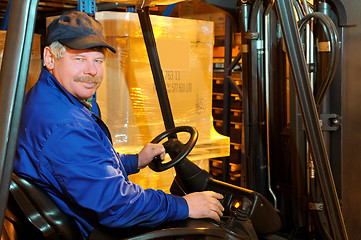 Image showing forklift loader worker at warehouse