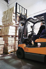 Image showing Forklift loader in warehouse