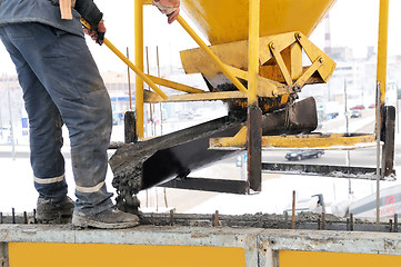 Image showing construction worker at concrete work