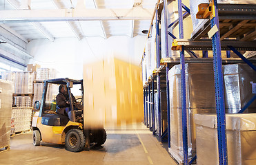 Image showing at a warehouse with forklift loader