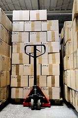 Image showing manual fork pallet truck in warehouse