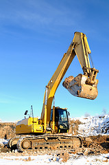 Image showing loader excavator in open cast in winter