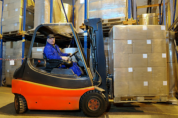 Image showing forklift loader worker at warehouse