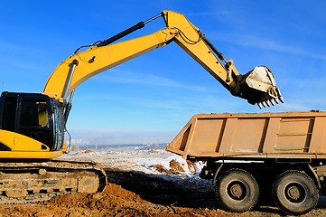 Image showing loader excavator and rear-end tipper dumper