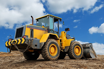 Image showing rear view of diesel wheel loader bulldozer