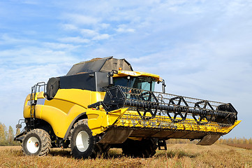 Image showing combine  harvester in the field