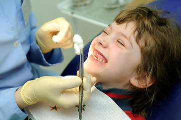 Image showing smiling girl at a dentist examination