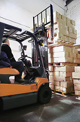 Image showing Forklift loader in warehouse