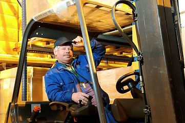 Image showing forklift loader worker at warehouse