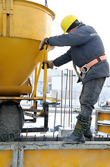 Image showing construction worker at concrete work