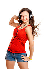 Image showing Young girl listen music