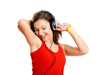Image showing Young girl listen music