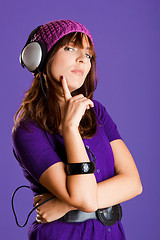 Image showing Beautiful woman listening music