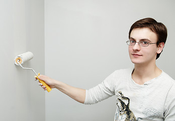 Image showing Painter worker decorator with roller