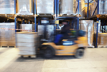 Image showing forklift in motion at warehouse