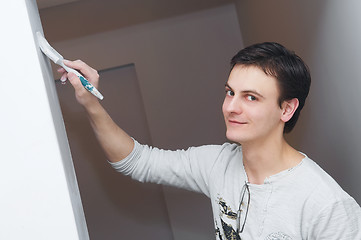 Image showing Painter worker decorator with brush