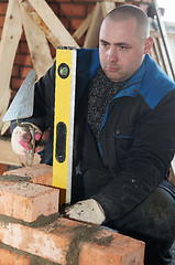 Image showing construction mason worker bricklayer