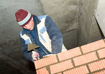 Image showing construction mason worker bricklayer