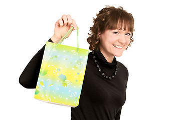 Image showing smiling girl buyer with present bag