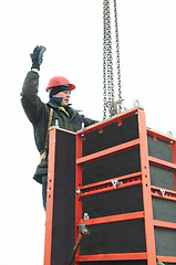 Image showing worker builder and concrete formwork