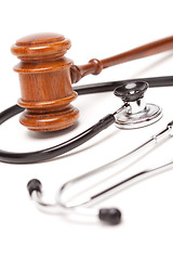 Image showing Black Stethoscope and Gavel on White