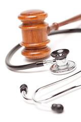 Image showing Black Stethoscope and Gavel on White