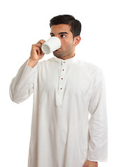 Image showing Arab man drinking coffee