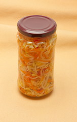 Image showing Glas jars with marinated vegetables  isolated on the white backg