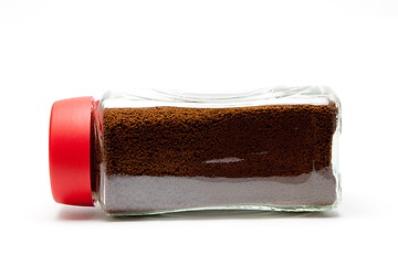 Image showing coffee in a glass jar under the white background