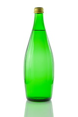 Image showing A bottle of mineral water reflected on white background