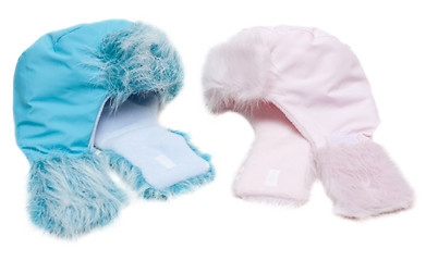 Image showing Two winter baby fur hats, rose and blue