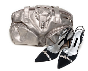 Image showing Silvery leather bag and pair of the loafer