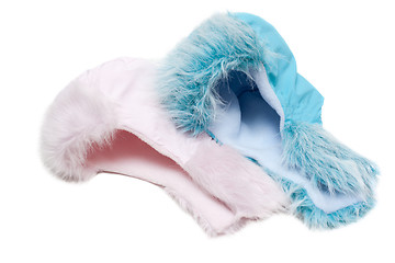 Image showing Two winter baby fur hats, rose and blue