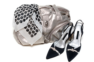 Image showing Silvery leather bag and pair of the loafer