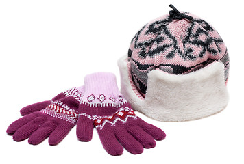 Image showing Winter hat with fur and violet gloves