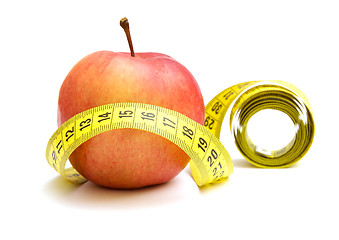 Image showing Red apple and measuring tape