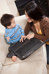 Image showing Mother and son with laptop