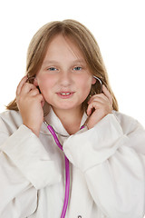 Image showing young girl pretending to be a doctor