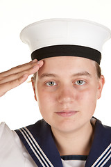 Image showing young sailor saluting isolated white background