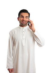 Image showing Arab ethnic businessman talking cellphone