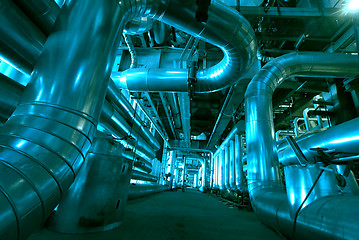 Image showing Pipes, tubes, machinery and steam turbine at a power plant
