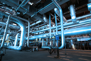 Image showing Pipes, tubes, machinery and steam turbine at a power plant