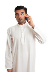 Image showing Ethnic businessman on cellphone