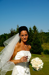 Image showing Bride with flower bouquet