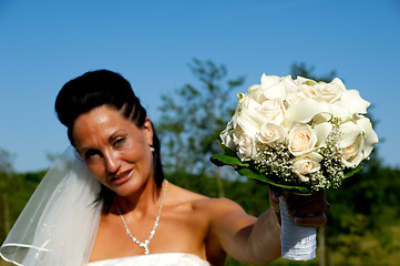 Image showing Bride with flower bouquet