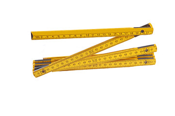 Image showing Yellow wooden ruler.