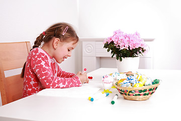 Image showing Painting Easter eggs