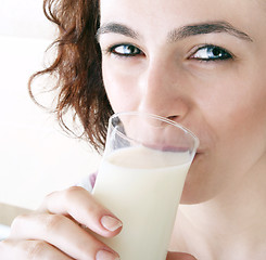 Image showing Young people eating milk with cereals