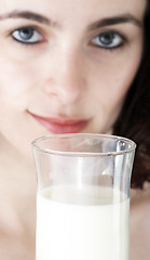 Image showing Young people eating milk.